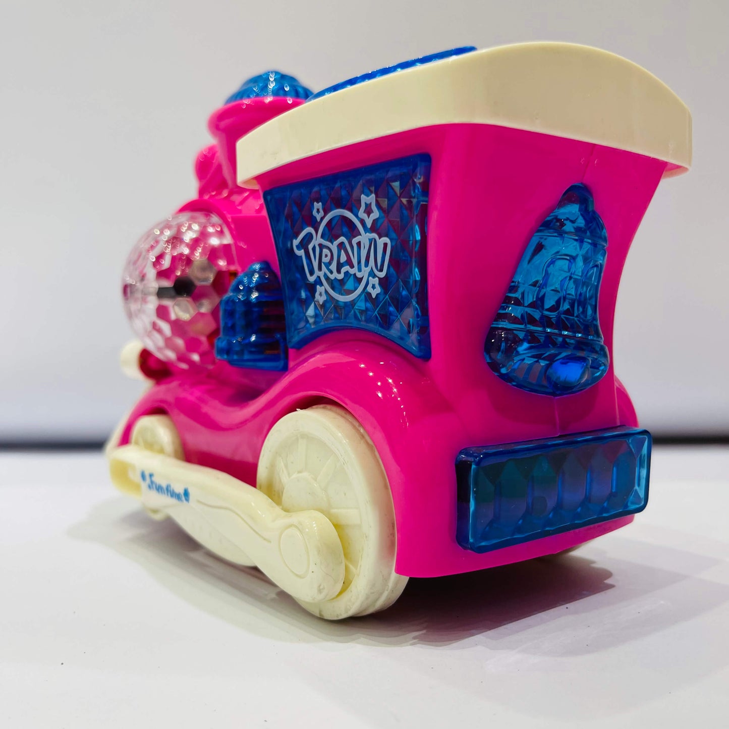 Colorful toy train on white background