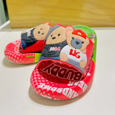 Children's sandals with teddy bear design and text on a white surface.