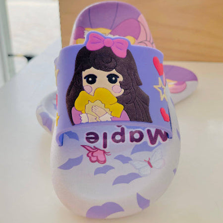 Cartoon character sandal with a purple background and 'Maple' branding.