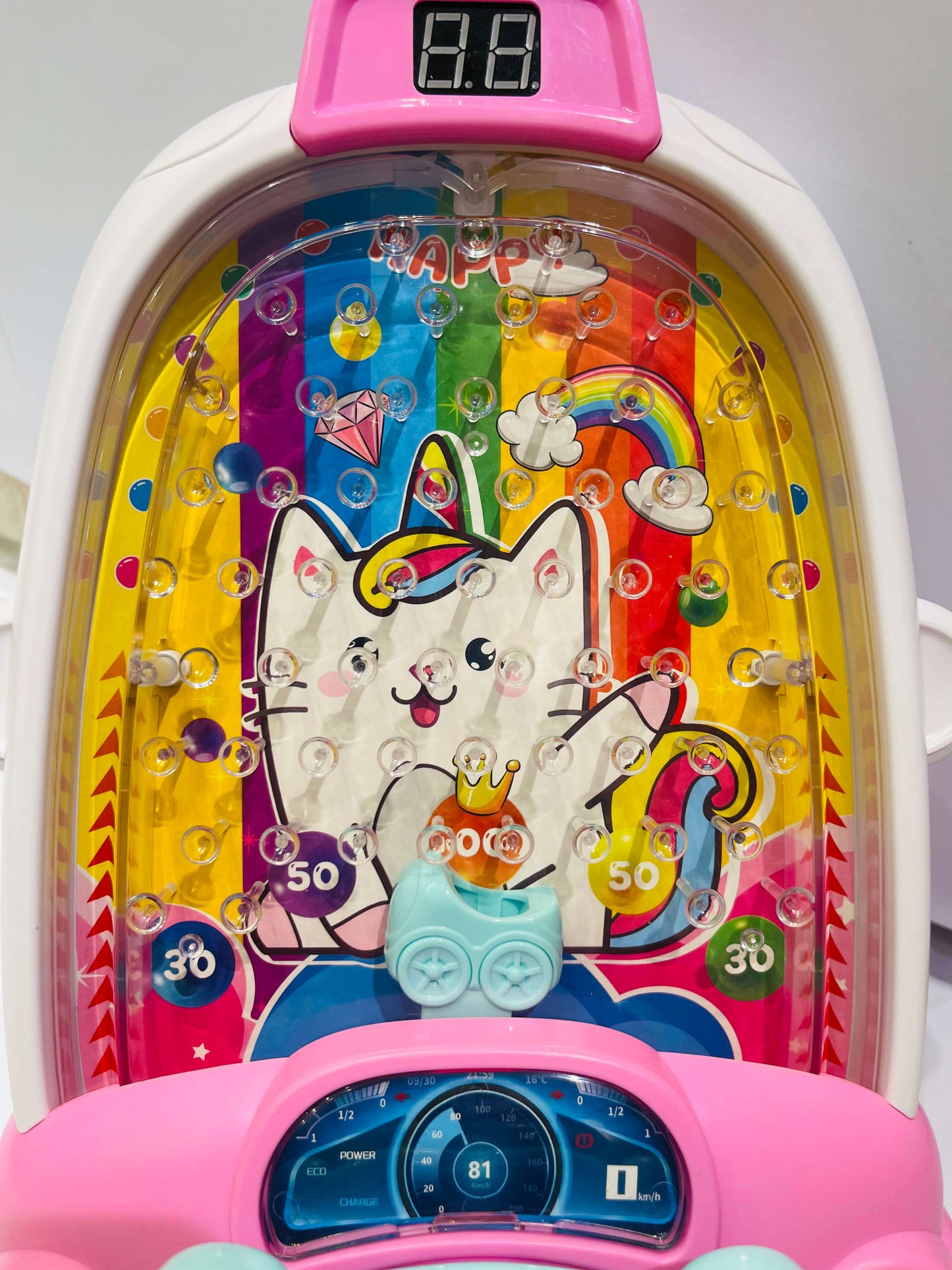 Colorful toy with a cartoon cat design on a white background