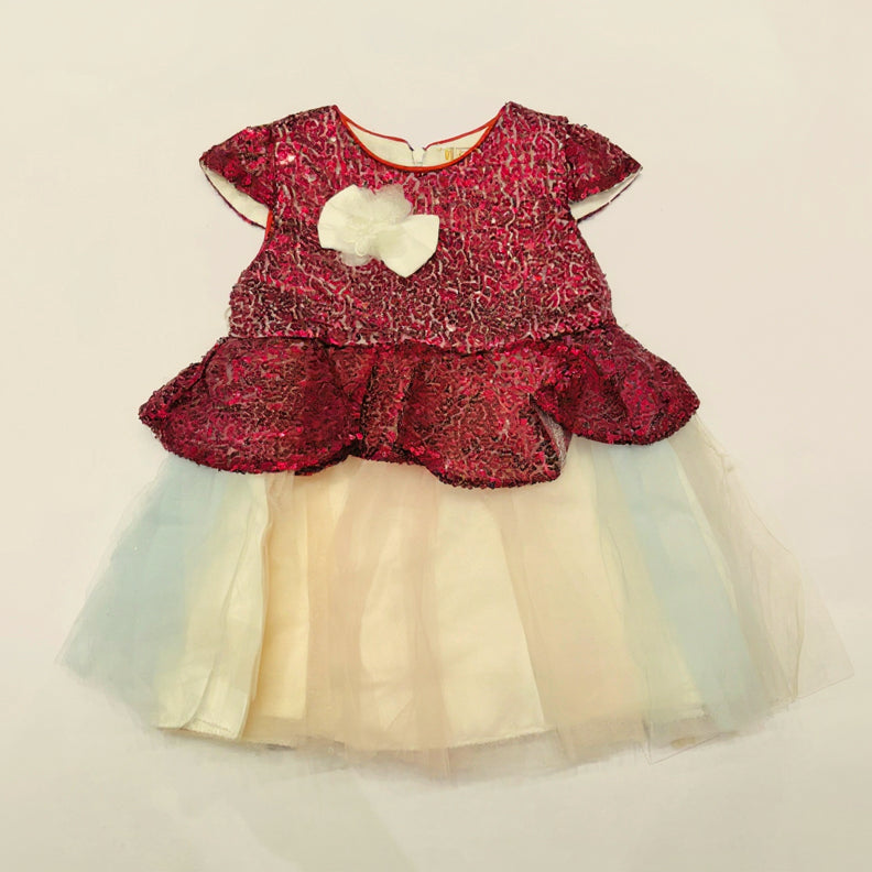 Children's dress with red floral top and white tulle skirt