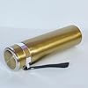 Gold cylindrical object with a black handle on a white background