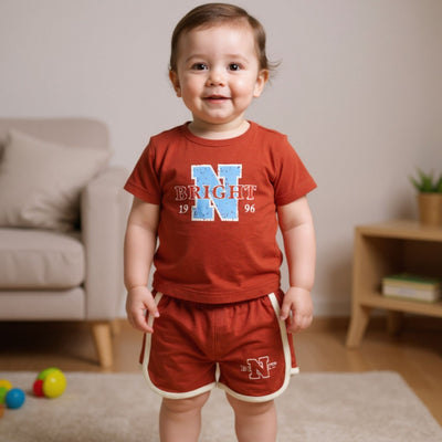 Child wearing a red outfit with 'N Bright 96' text in a living room setting