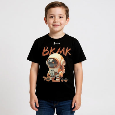 Child wearing a black t-shirt with a robot graphic and 'BKMK' text on a white background
