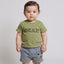 Child wearing a green t-shirt with 'BEAR' printed on it and gray shorts with a bear design.