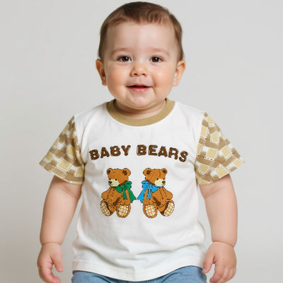 Child wearing a white t-shirt with teddy bear design and 'Baby Bears' text on a plain background