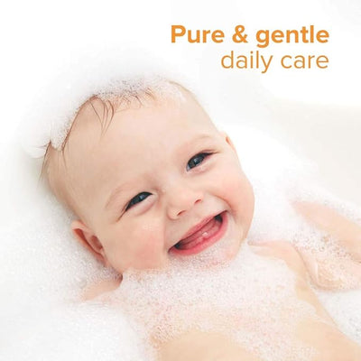 Baby in a bubble bath with 'Pure & gentle daily care' text