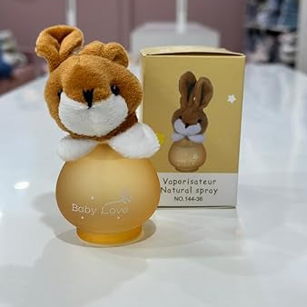 Vaporizer with rabbit design and packaging on a white surface