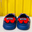 Blue shoes with red visors and 'HEVUN' branding on a yellow background