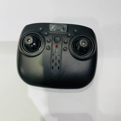 Black remote control device on a white background