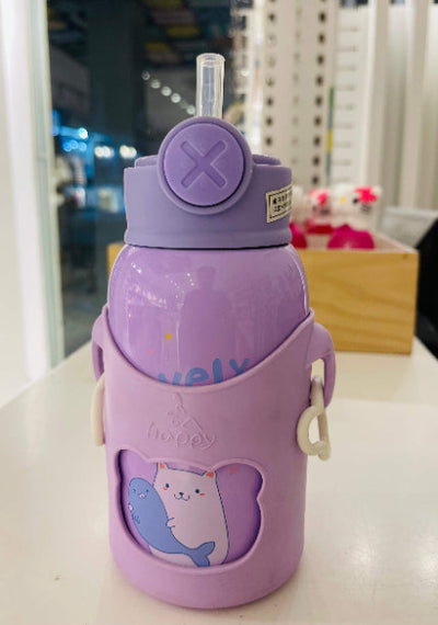 Purple water bottle with a cartoon design on a white surface