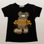  MSLO Black t-shirt with gold and white graphic design on a light gray background