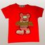 Red t-shirt with a graphic design on a light gray background