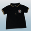 Black polo shirt with a logo.