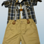 Plaid shirt with suspenders and beige shorts.