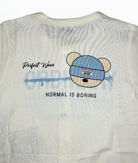 White t-shirt with a graphic of a bear wearing a blue cap and text on the back