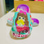 Colorful children's sandals with a cartoon character design on a white surface.