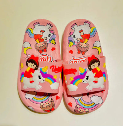 Pink children's sandals with cartoon characters on a light pink background