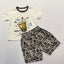 Children's t-shirt and shorts set with graphic design.