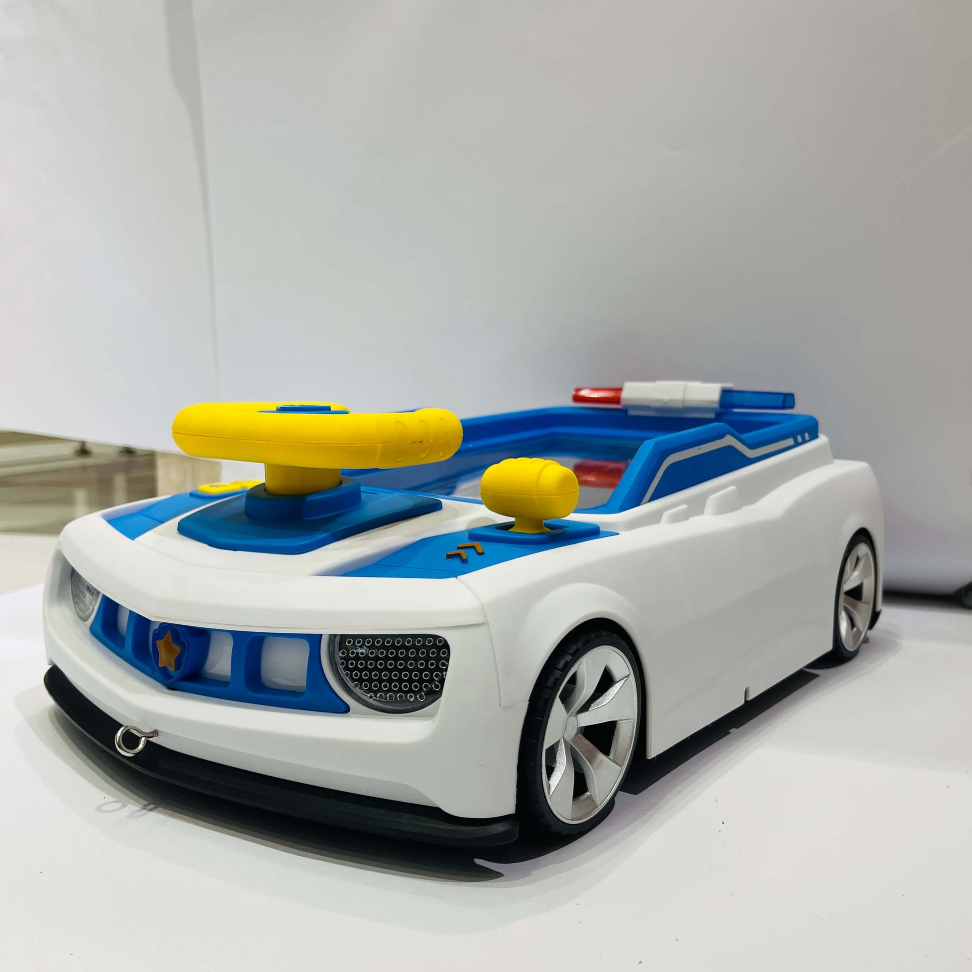 Toy car with police design on a white background