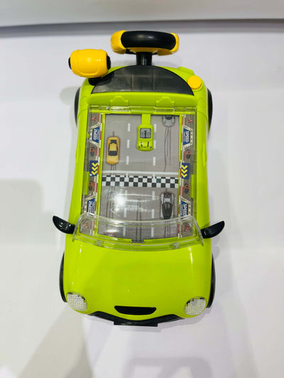Toy car with a transparent top showing a miniature cityscape on a white background