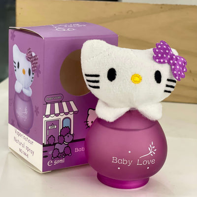 Purple Hello Kitty-shaped product with packaging on a wooden surface