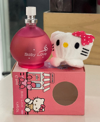 Pink 'Baby Love' perfume bottle with Hello Kitty design on packaging and plush toy.