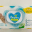 Pampers new baby wipes packaging on a light background