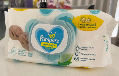 Pampers baby wipes package on a table