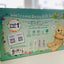 Welcome Baby Gift Set packaging with teddy bear illustration on a blurred background