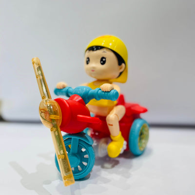 Toy figure of a character riding a red motorcycle with blue wheels on a white background