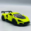 Yellow die-cast sports car model on a gray background