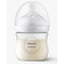 Philips Avent baby bottle with white cap on a light gray background