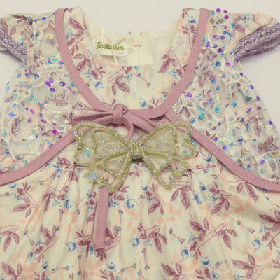 Floral dress with decorative bow.