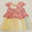 Pink floral dress with a yellow bottom