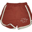 Red shorts with white trim.