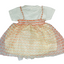 Children's dress with floral pattern on a white background