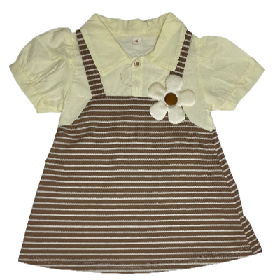 Children's outfit with a striped dress over a white shirt.
