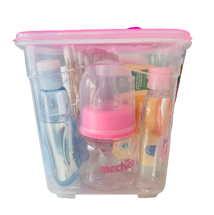 Clear container with baby bottles and accessories on a white background