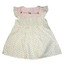 White dress with floral pattern on a white background