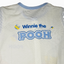 Baby romper with 'Winnie the Pooh' text and logo on a light background