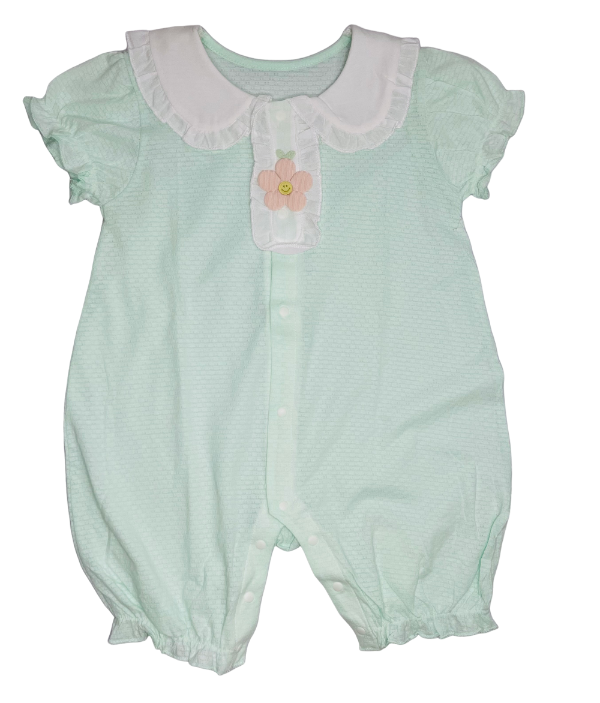 Light green baby romper with white collar and flower design on a white background