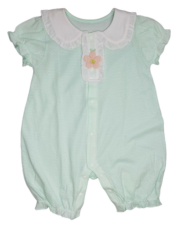 Light green baby romper with white collar and flower design on a white background